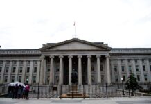 Statsoligasjonssalget sprer seg globalt US Treasury-bygningen